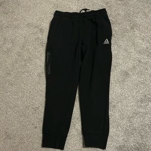 Men’s Reebok fleece joggers, size Medium.